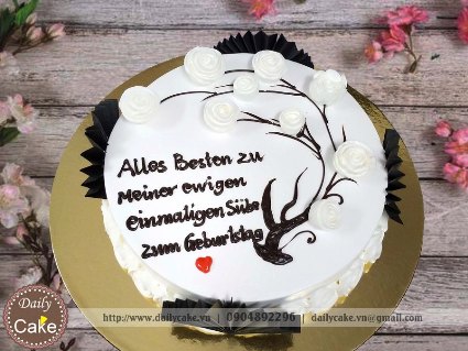 Bánh gato hoa kem tông đen trắng tinh tế