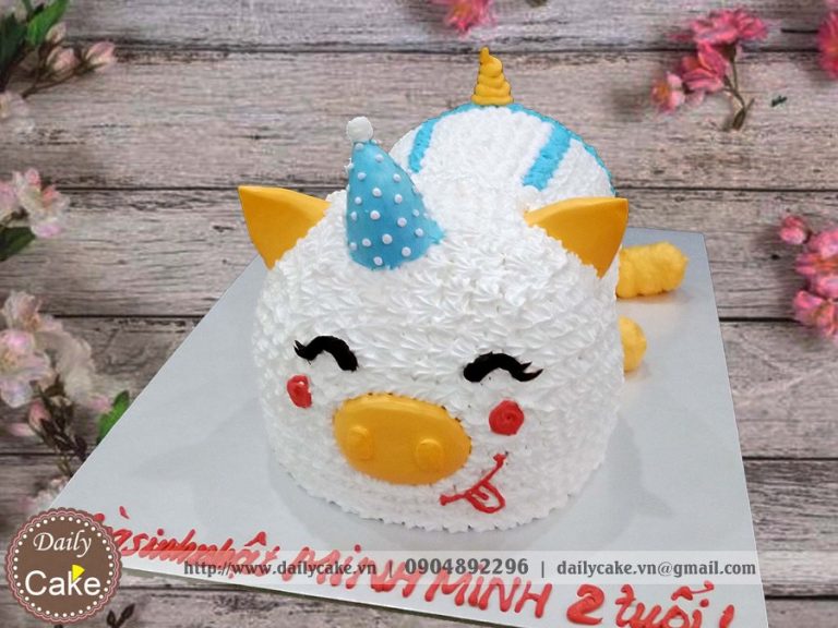 Bánh gato hình chú lợn màu xanh đáng yêu